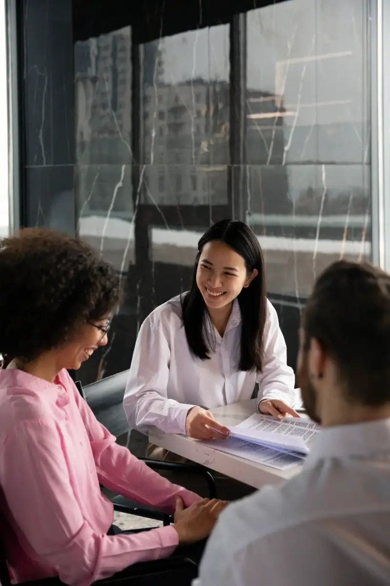 People meeting around a table for coordinated care planning